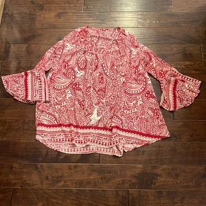 Red/white mini dress with fitted sleeve attached to an oversized sleeve cuff